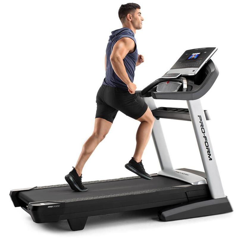 man running on treadmill 
